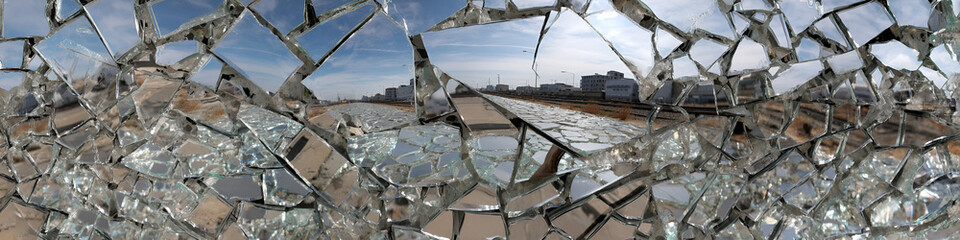 Endless chain of shattered mirrors creating a distorted panoramic view