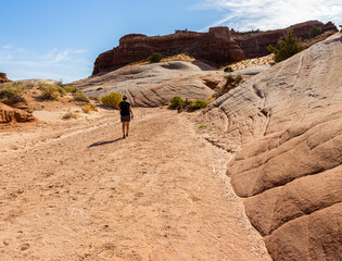 Female Hiker on The Nautilus Trail, Paria Canyon-Vermillion Cliffs Wilderness, Utah, USA
