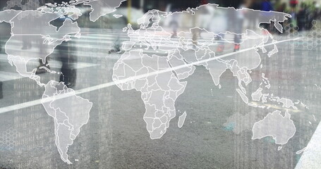 Walking blurred pedestrians crossing wet crosswalk, with digital world map overlay and binary code
