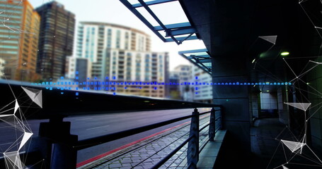 Fototapeta premium Framing metal railing lining sidewalk beside road under glass canopy, wireframe shapes, copy space