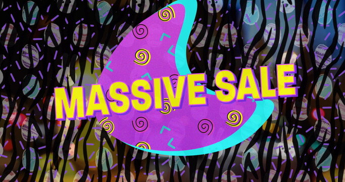 Displaying purple shape featuring yellow MASSIVE SALE in digital ad, with black stripes and circles