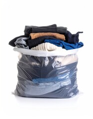 Bag overflowing with folded, casual clothing, ready for storage or donation.
