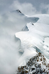 Mont Blanc du Tacul (4248m), surrounded by stormy clouds, Mont Blanc massif, Haute Savoie, France, Europe