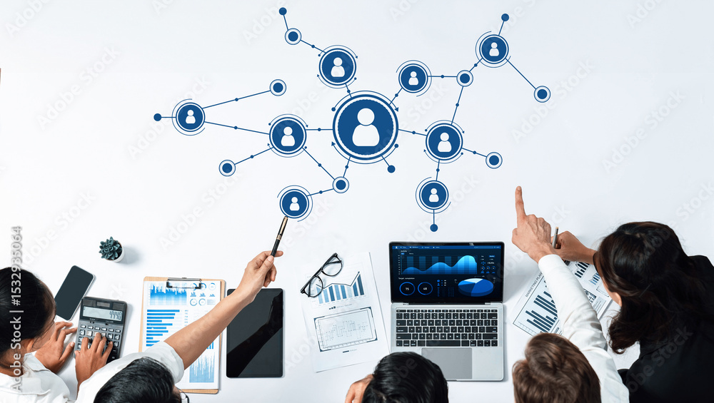 Poster A team collaborates on a networking strategy, analyzing data and sharing insights in a professional office setting, enhancing communication and innovation. Amity