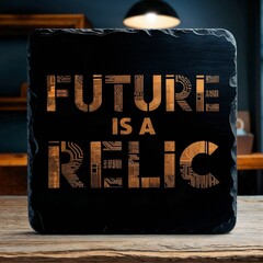 A black square plaque with copper text reading 'FUTURE IS A RELIC' featuring circuit board patterns, set on a wooden surface in an indoor space.