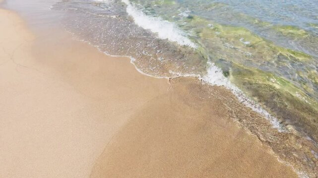Beautiful tropical sandy beach with sea and waves. Summer vacation and nature environment concept.