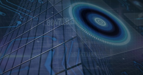 Hologram disk floating over mirrored skyscraper facade with circuit traces, gridlines, copy space © vectorfusionart