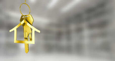 Displaying house-shaped gold keychain hanging in gray interior, with two gold keys, copy space