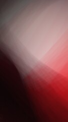 A striking blend of red and pink hues creates a seamless gradient with soft transitions. The vivid colors merge fluidly, forming a dynamic and visually captivating abstract composition.