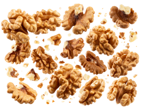 Cracked walnuts with shell fragments falling in slow motion, dramatic lighting, isolated PNG