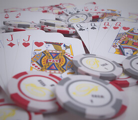 Closeup shot of poker cards and chips on a white background