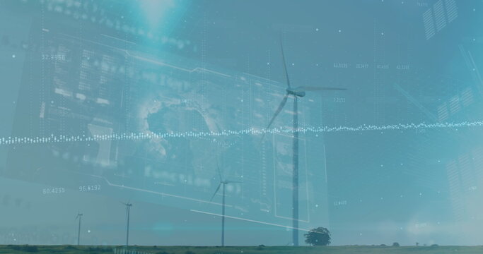 Spinning three wind turbines near lone tree on grassy field, with digital overlays showing data