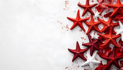 Red and white starfish on a textured background.