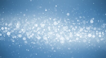Sparkling light bokeh on soft blue background for festive designs