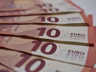 Closeup shot of a pile of ten Euro banknotes