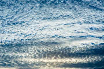 Dark cloudy sky with intricate formations.