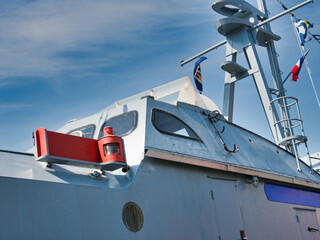 Naval ship pluto of the comradeship in Hameln, Germany under a wispy sky