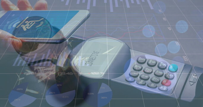 Displaying smartphone using POS terminal at checkout, showing bar, line and pie chart overlays