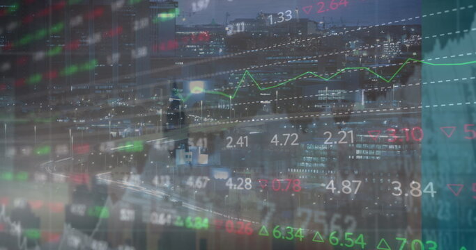 Financial data glowing over city highways at night, with green line graph, data indicators, values