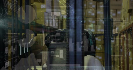 Analyzing holograms individual wearing VR headset and hoodie at data center, server rack streams