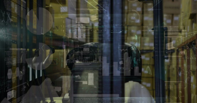 Analyzing holograms individual wearing VR headset and hoodie at data center, server rack streams