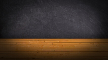 Blackboard above a parquet flooring