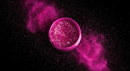 Pink glitter explosion against black background
