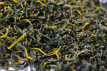 Dried mulberry leaves, commonly used for herbal tea and traditional remedies.