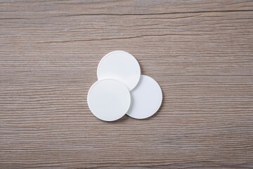 White circle paper and space for text on old wooden background.