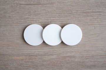 White circle paper and space for text on old wooden background.
