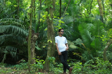 young man in jungle