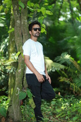 young man in a forest