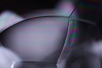 Gray glossy liquid, dark minimalistic background, melted aluminium surface, liquid glass effects
