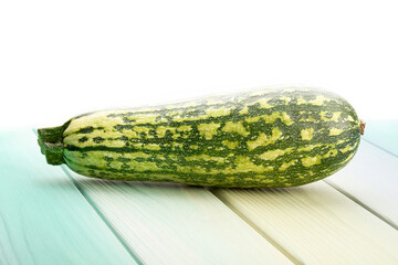 marrow zucchini on wood background