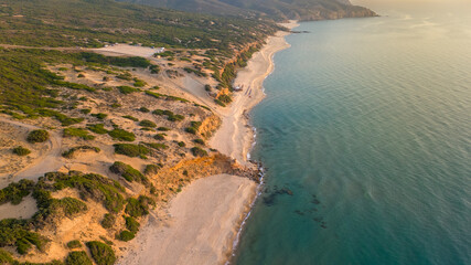 Scivu beach, sunset view of a beautiful beach in Sardinia