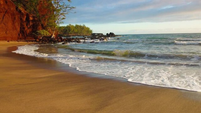 The Red Sand Of Koki Beach and  The Red Walls of Ka iwi o Pele , Koki Beach Park, Hana, Maui, Hawaii, USA