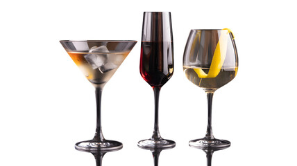 Three elegant cocktail glasses with different drinks on a black reflective surface studio shot