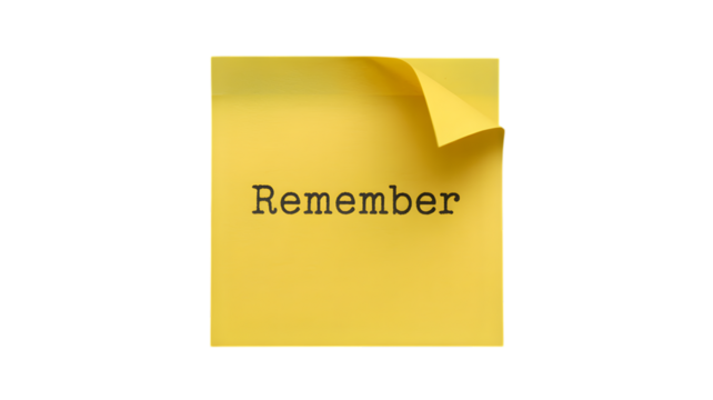 A yellow sticky note with the word remember in typewriter font on a black background with curled corner