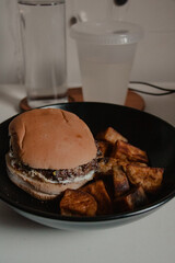 Burger and Potatoes on a Plate