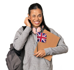Young Filipino Erasmus student covering ears with hands.