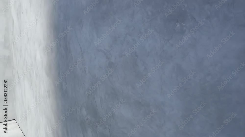 Aufkleber subtle gray concrete texture with light reflections and smooth panning motion creating a modern, sty