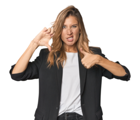 Young businesswoman in a suit showing thumb down and expressing dislike.