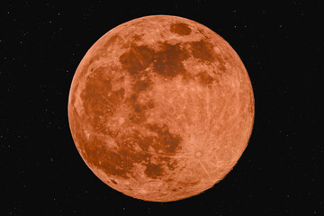 Moon over Bottrop/ NRW/ Germany - A vivid red full moon glowing in the night sky, surrounded by...
