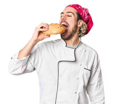 Young Caucasian chef with artisanal bread in studio