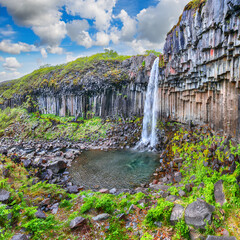 Ramarkable view of Svartifoss waterfall with basalt columns on southern part of Iceland.