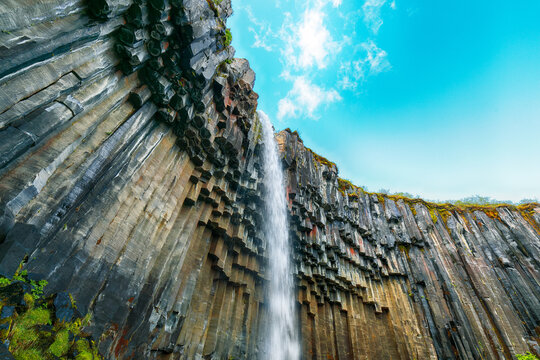 Impressive view of Svartifoss waterfall with basalt columns on southern part of Iceland.