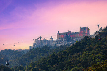 Scenic view of ba na hills with cable cars and castle at sunset in Da nang, Vietnam