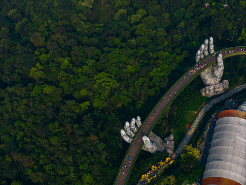 Golden bridge with giant hands in ba na hills, Da nang, Vietnam Aerial top view