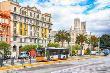Fototapeta premium Street with typical architecture of the old center of Cagliari and Town Hall, Municipio di Cagliari.