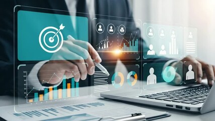 Person analyzing business data with digital interface and laptop in a professional setting view - Powered by Adobe